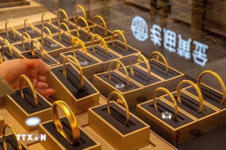 Giá vàng phục hồi khi đồng USD và lợi suất trái phiếu hạ nhiệt