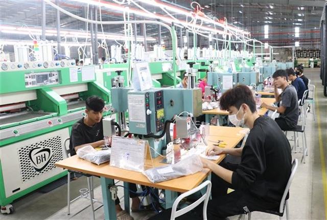 Eight-month economy stays on track, but business pressures remain